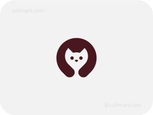 Cultmark Minimalist Cat logo, dark brown vector symbol using negative space to form a cat head within a circle, representing companionship and pet care for veterinary or pet shop business identity.
